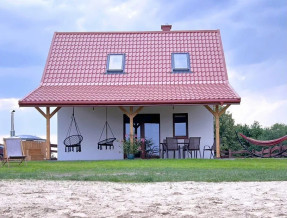 Domki nad jeziorem z banią i jacuzzi