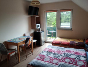 Pokoje i domki letniskowe w Mikołajkach  w miejscowości Mikołajki